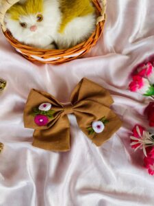 Brown Elegance in Bloom – The Hand-Stitched Garden Bow