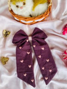 Purple Bloom – Soft Cotton Hair Bow with Hand-Embroidered Pink Hearts